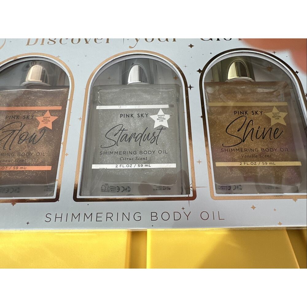 PINK SKY SHIMMERING BODY OIL. VANILLA, CITRIS, COCONUT. NEW. SEALED.